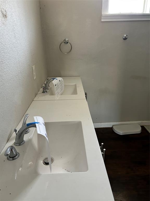 103 East Cayuga Drive Athens, TX 75751 - Photo 5 of 11 a bathroom with a sink