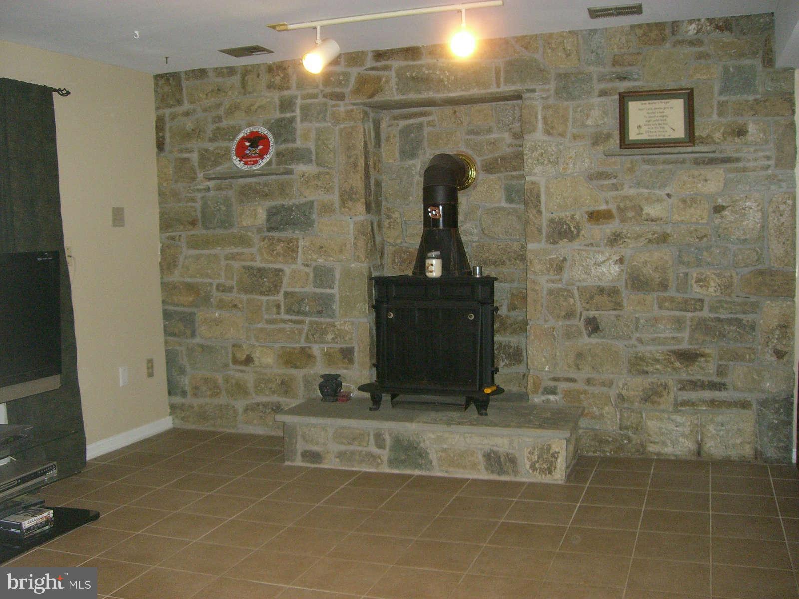 10256 Greystone Road Manassas, VA 20111 - Photo 8 of 23 Rec room w/wood stove