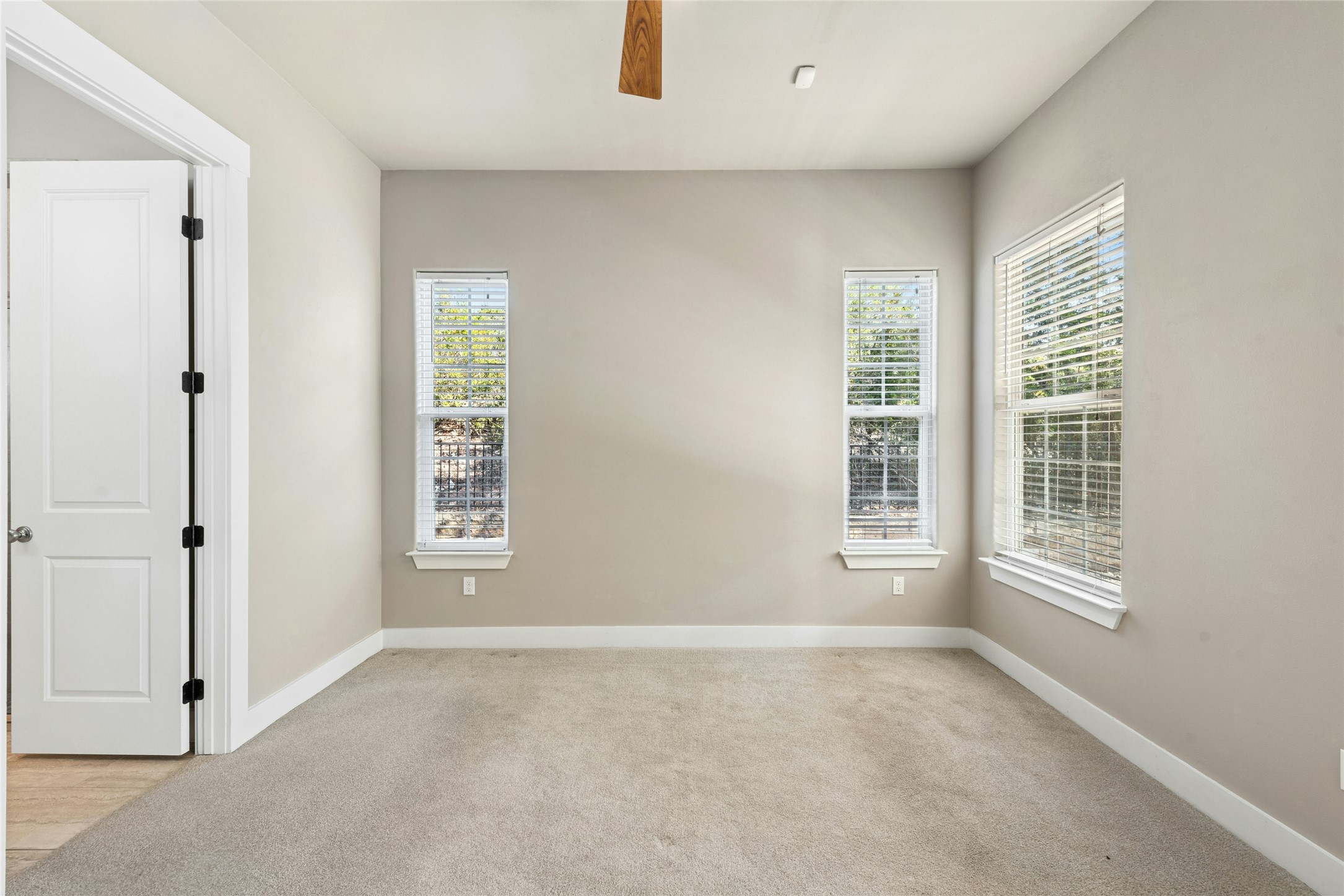 4301 Mansfield Dam Road, Unit 2101 Austin, TX 78734 - Photo 19 of 40 an empty room with windows