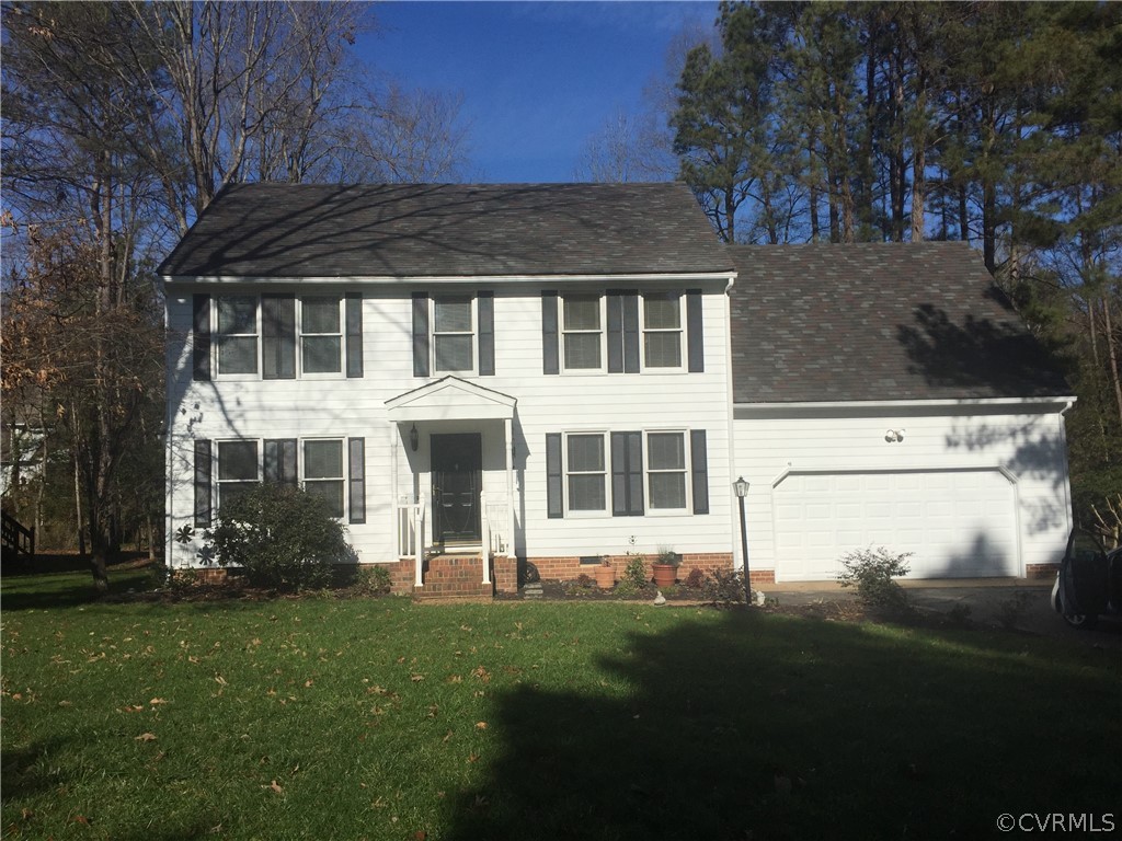 14100 Fiddlers Ridge Road Midlothian, VA 23112 - Photo 19 of 19 a front view of a house with a garden