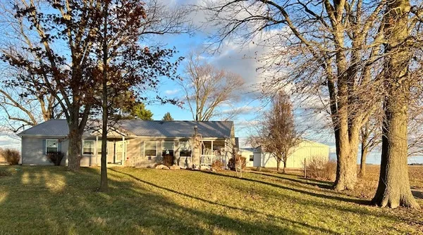 a view of a town with pathway and trees