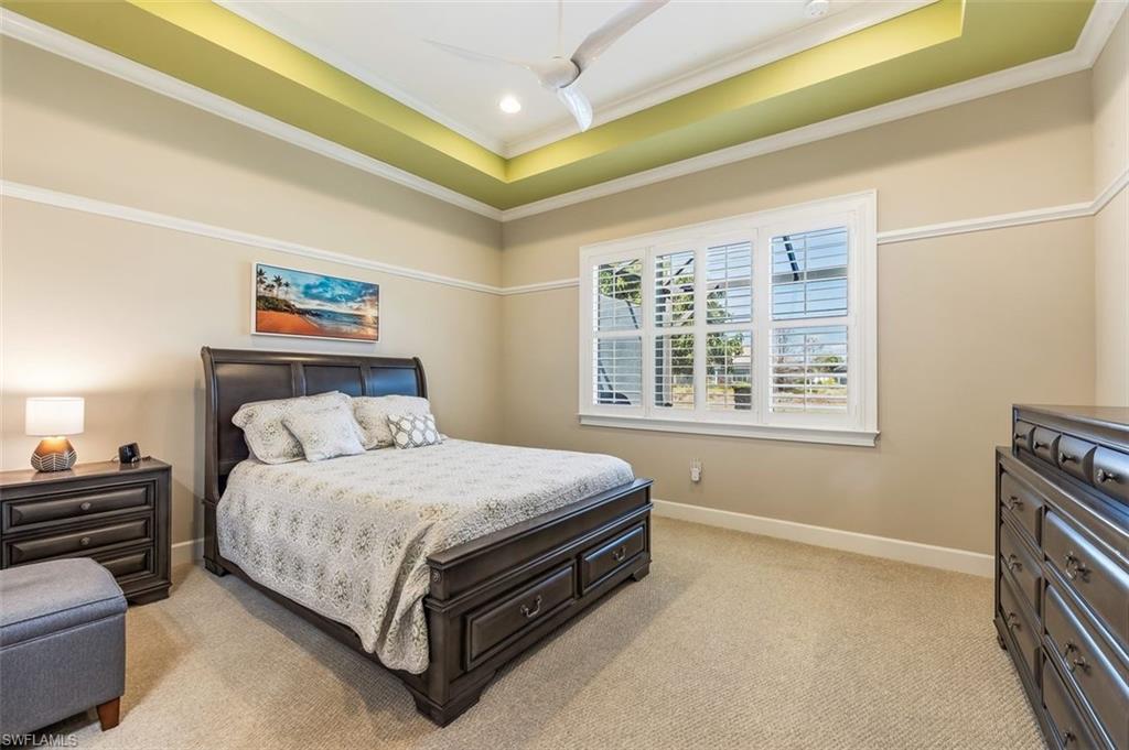 6931 Cay Court Naples, FL 34113 - Photo 9 of 24 Living room featuring ornamental molding, recessed lighting, and a raised ceiling