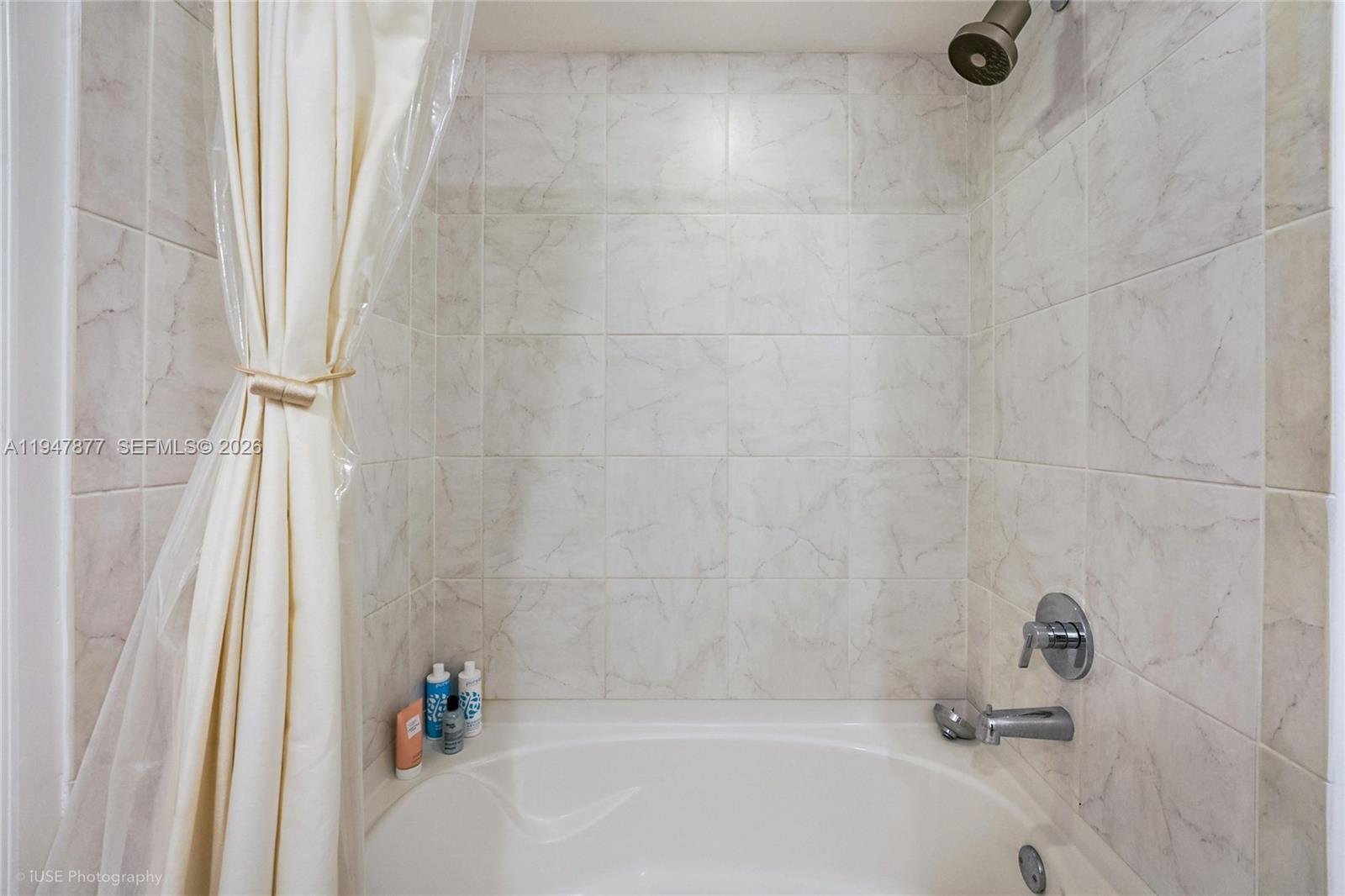951 Brickell Avenue, Unit 1110 Miami, FL 33131 - Photo 21 of 28 a bathroom with a bathtub