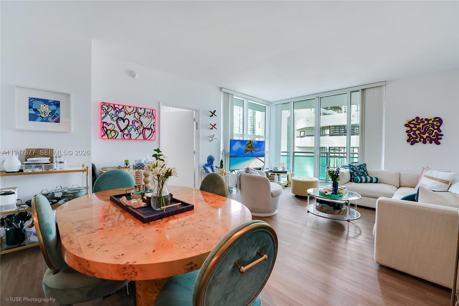 951 Brickell Avenue, Unit 1110 Miami, FL 33131 - Photo 7 of 28 a living room with furniture and wooden floor