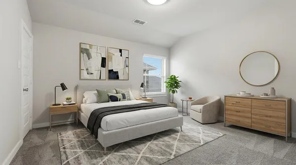 a bedroom with bed and a chandelier