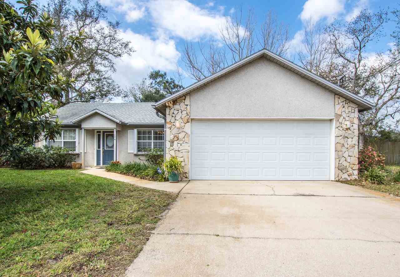 174 Segovia Road St. Augustine, FL 32086 - Photo 1 of 40 a front view of house with yard and green space