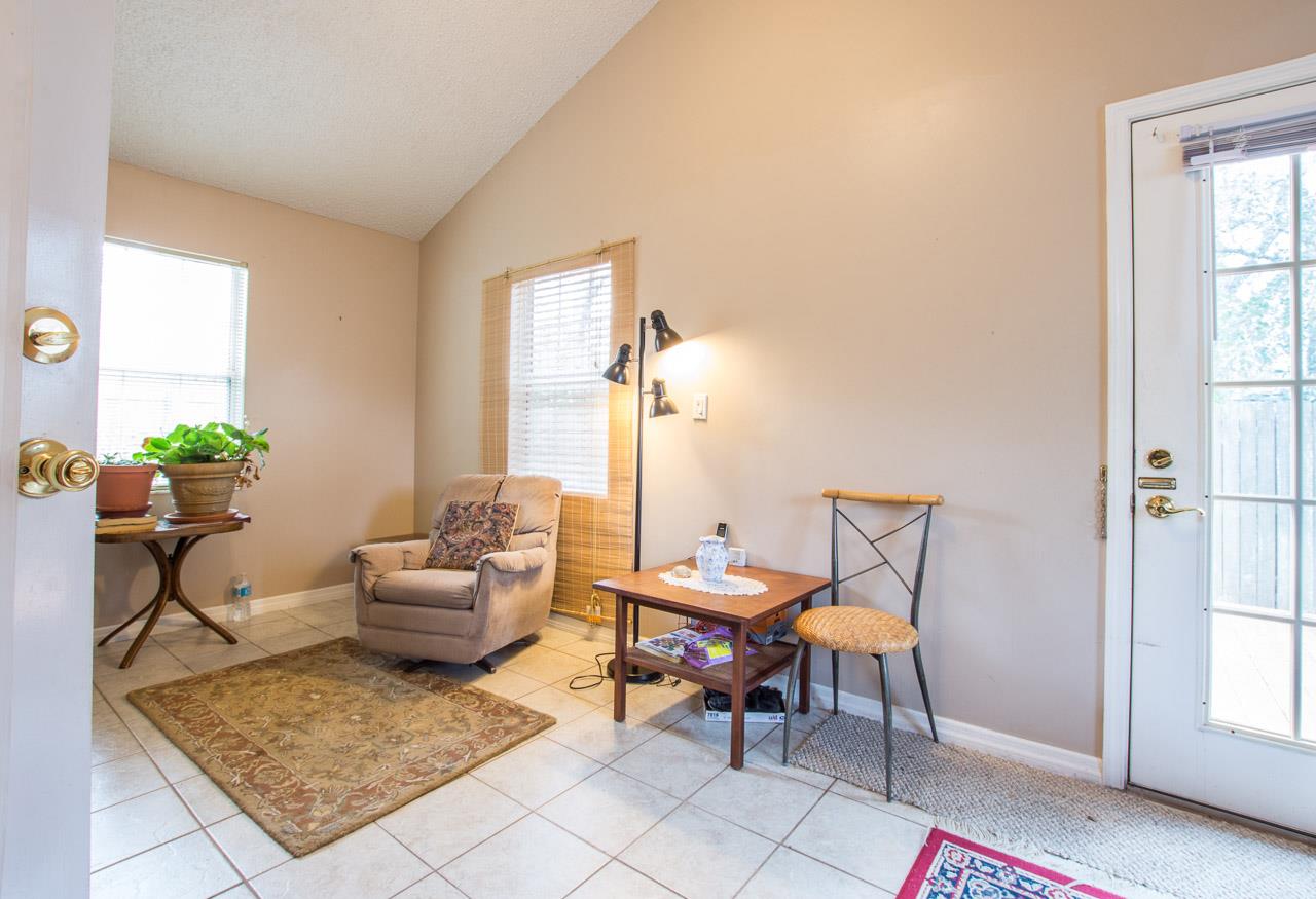 174 Segovia Road St. Augustine, FL 32086 - Photo 17 of 40 a living room with furniture and a window