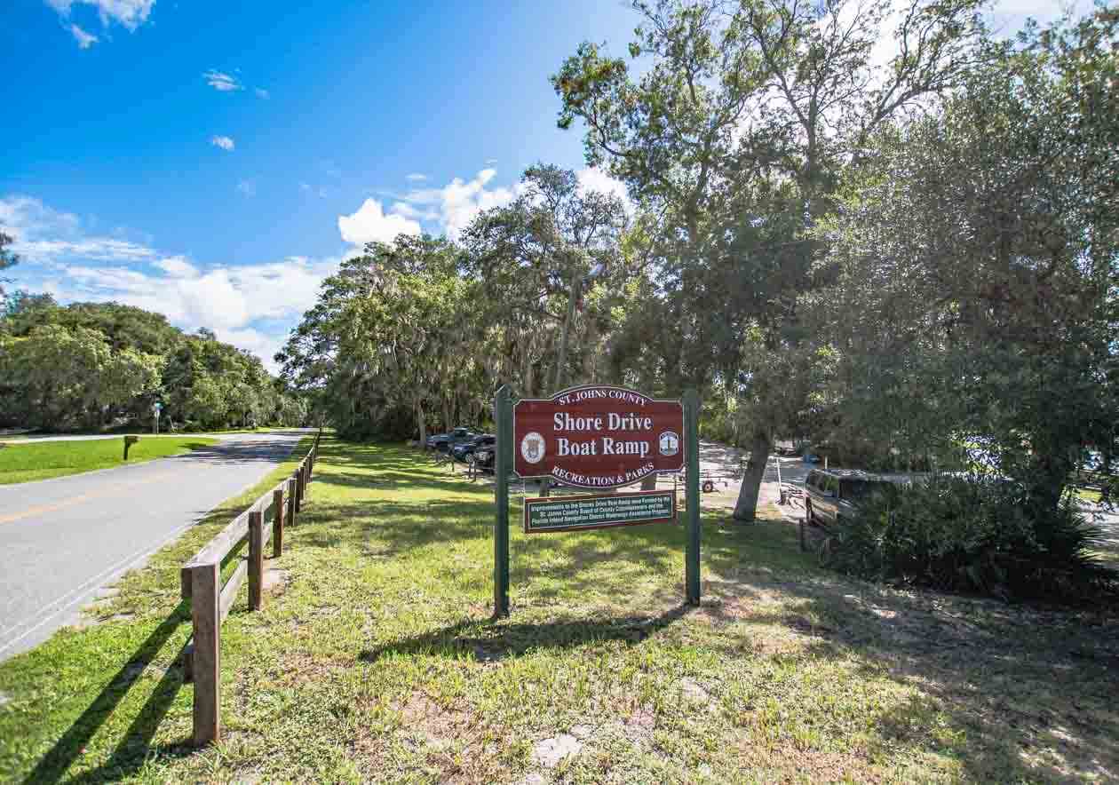 174 Segovia Road St. Augustine, FL 32086 - Photo 29 of 40 a sign board with a house in the background