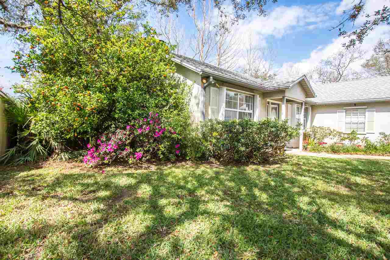 174 Segovia Road St. Augustine, FL 32086 - Photo 6 of 40 a front view of a house with a yard