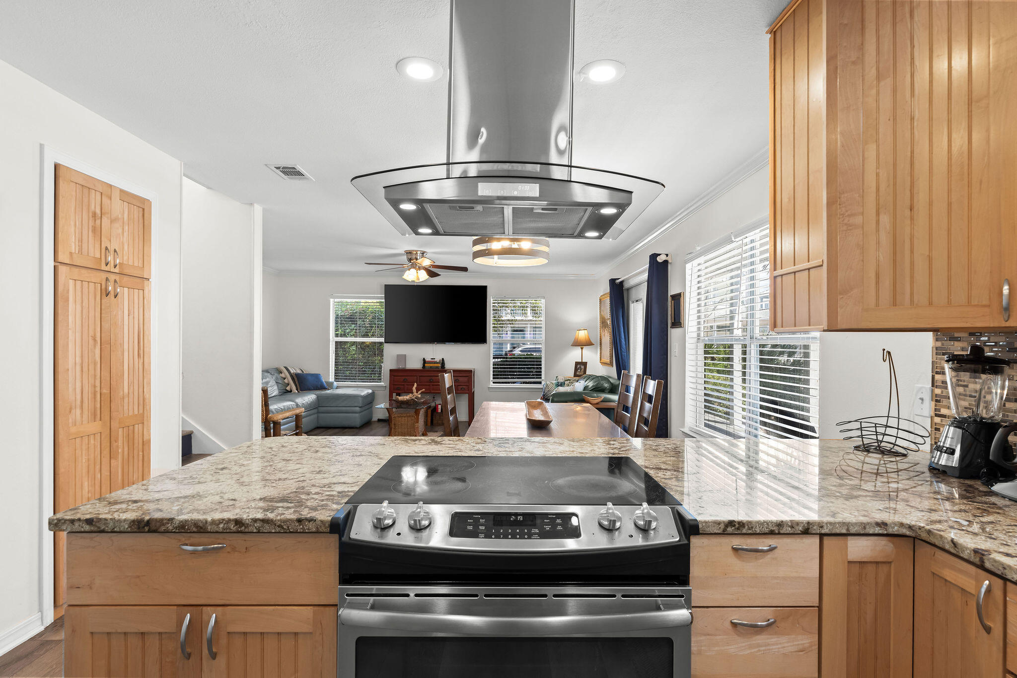 91 Matthew Boulevard Destin, FL 32541 - Photo 26 of 85 a kitchen with stainless steel appliances granite countertop a stove and a sink