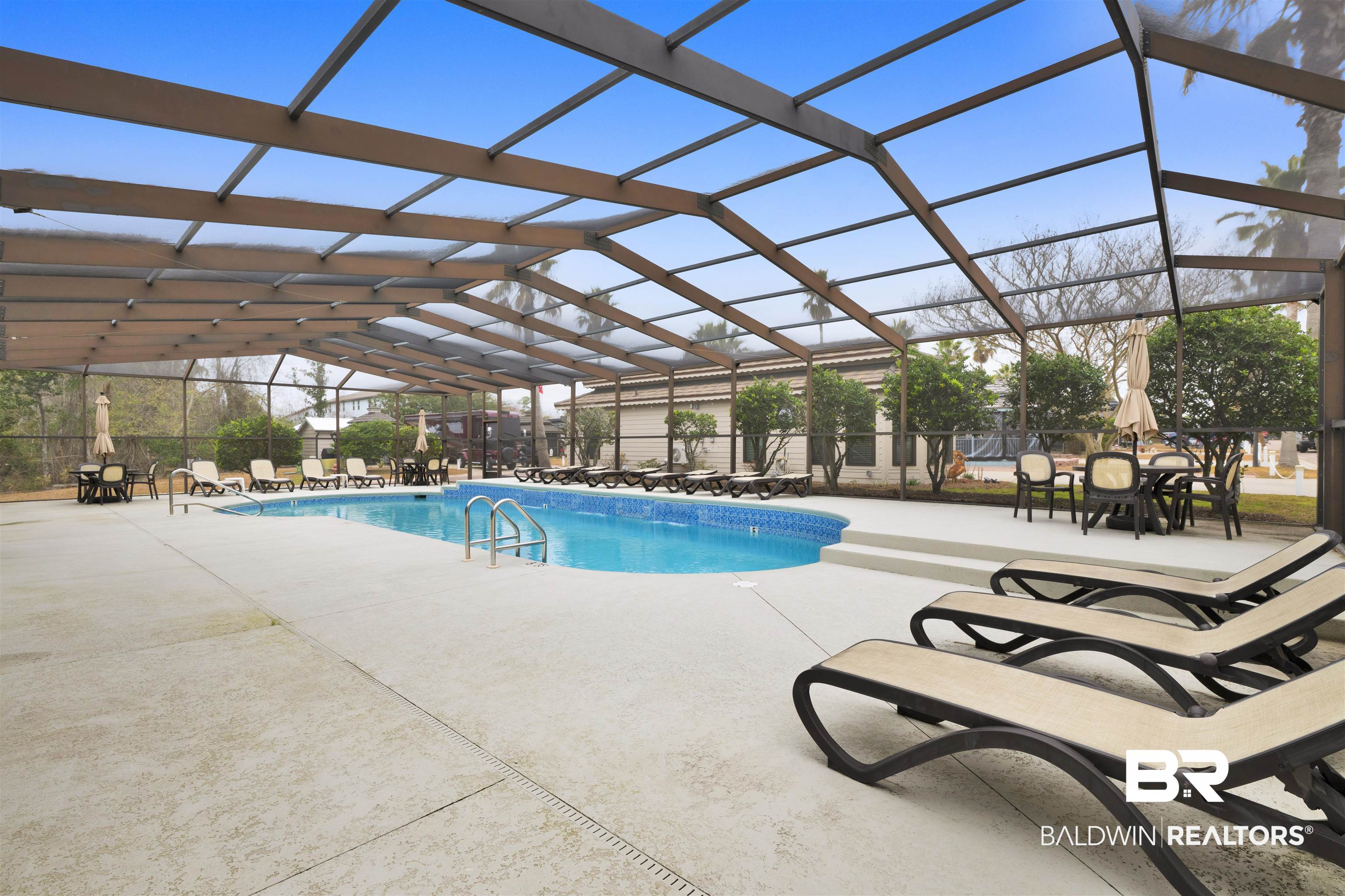4650 Griffith Marina Road, Unit LOT 24 Orange Beach, AL 36561 - Photo 22 of 34 Community pool featuring a patio and a lanai