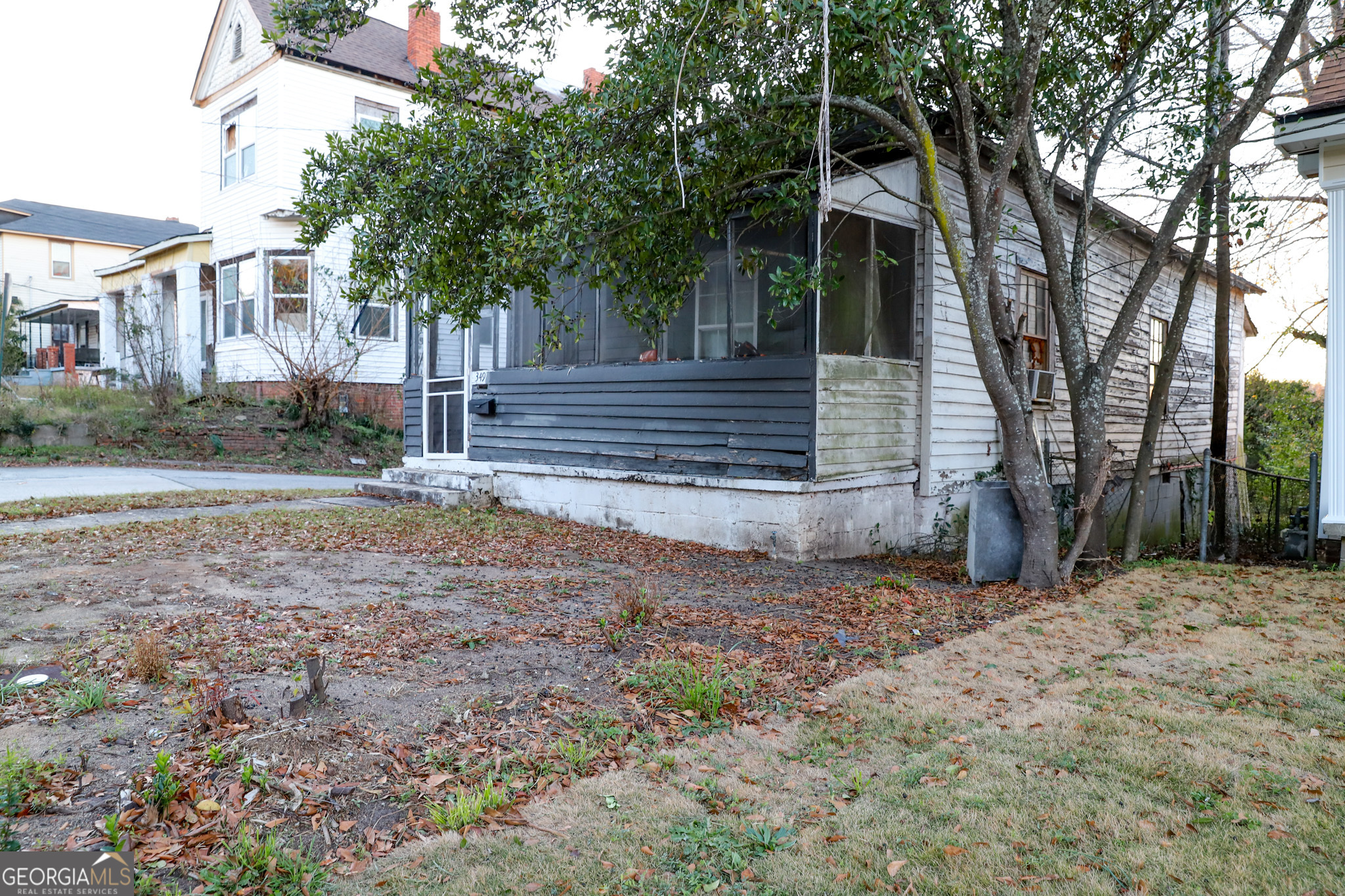 349 Madison Street Macon, GA 31201 - Photo 3 of 11 a view of a house with a yard