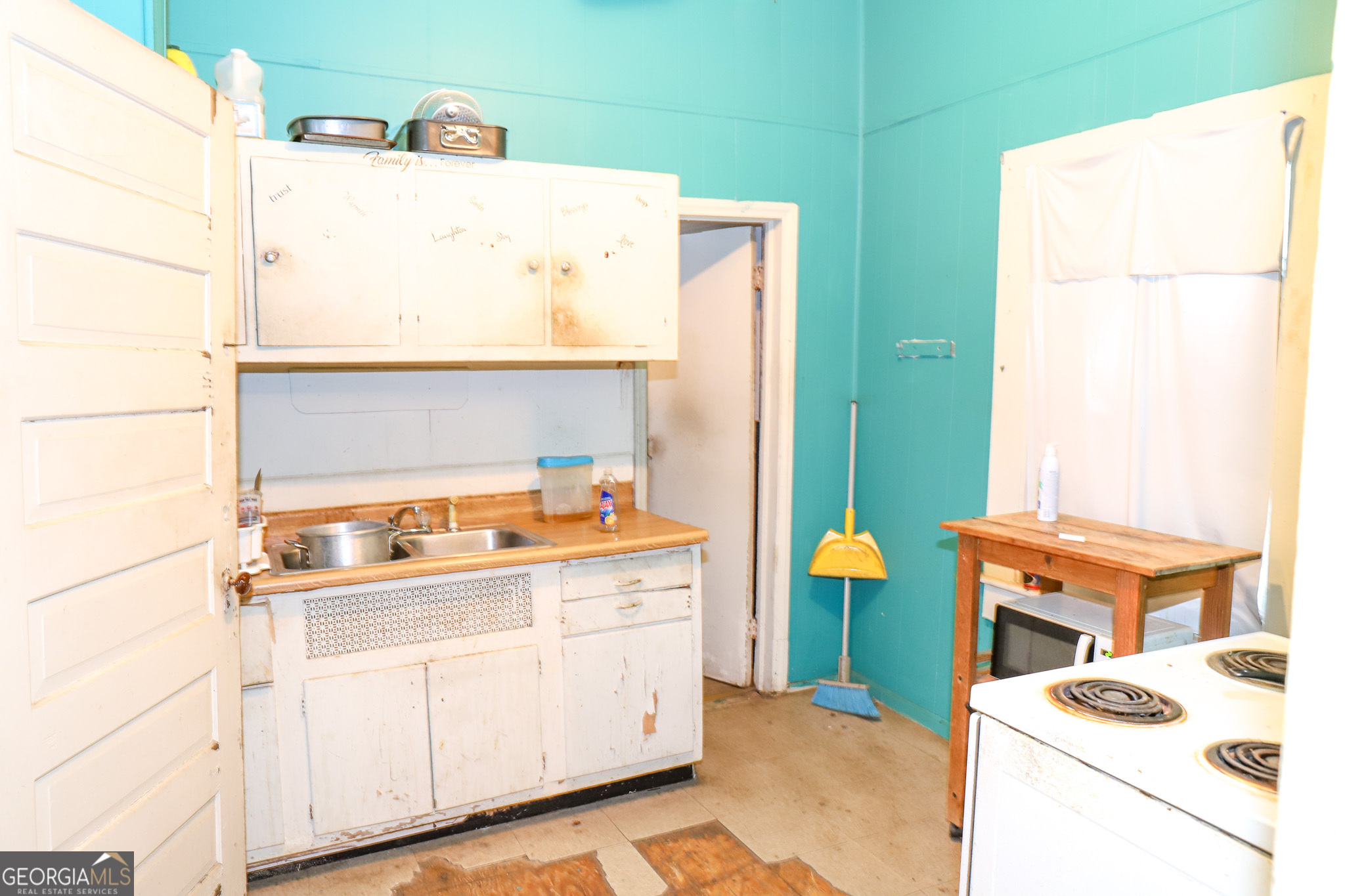349 Madison Street Macon, GA 31201 - Photo 6 of 11 a utility room with dryer and washer