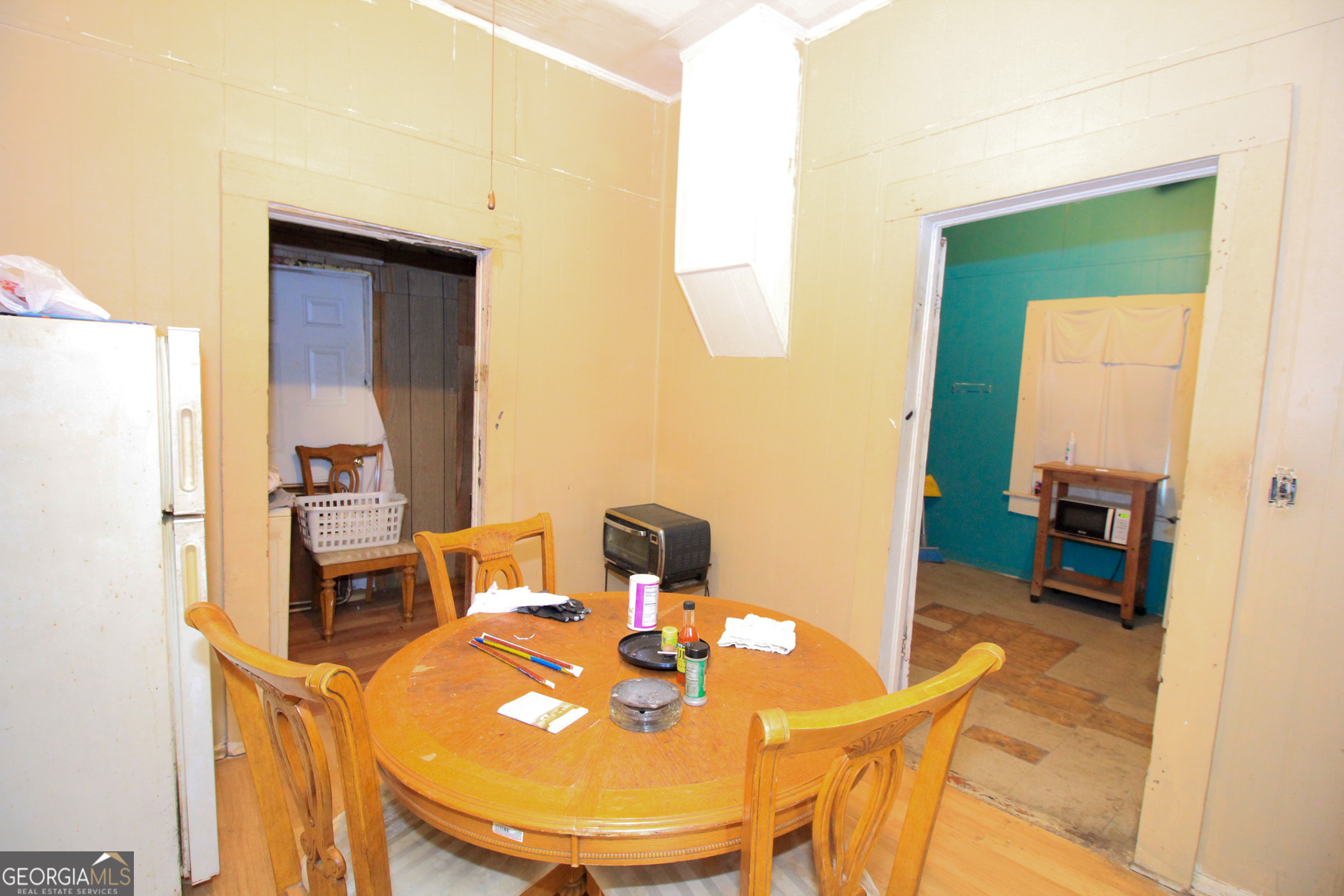 349 Madison Street Macon, GA 31201 - Photo 8 of 11 a dining room with furniture and wooden floor