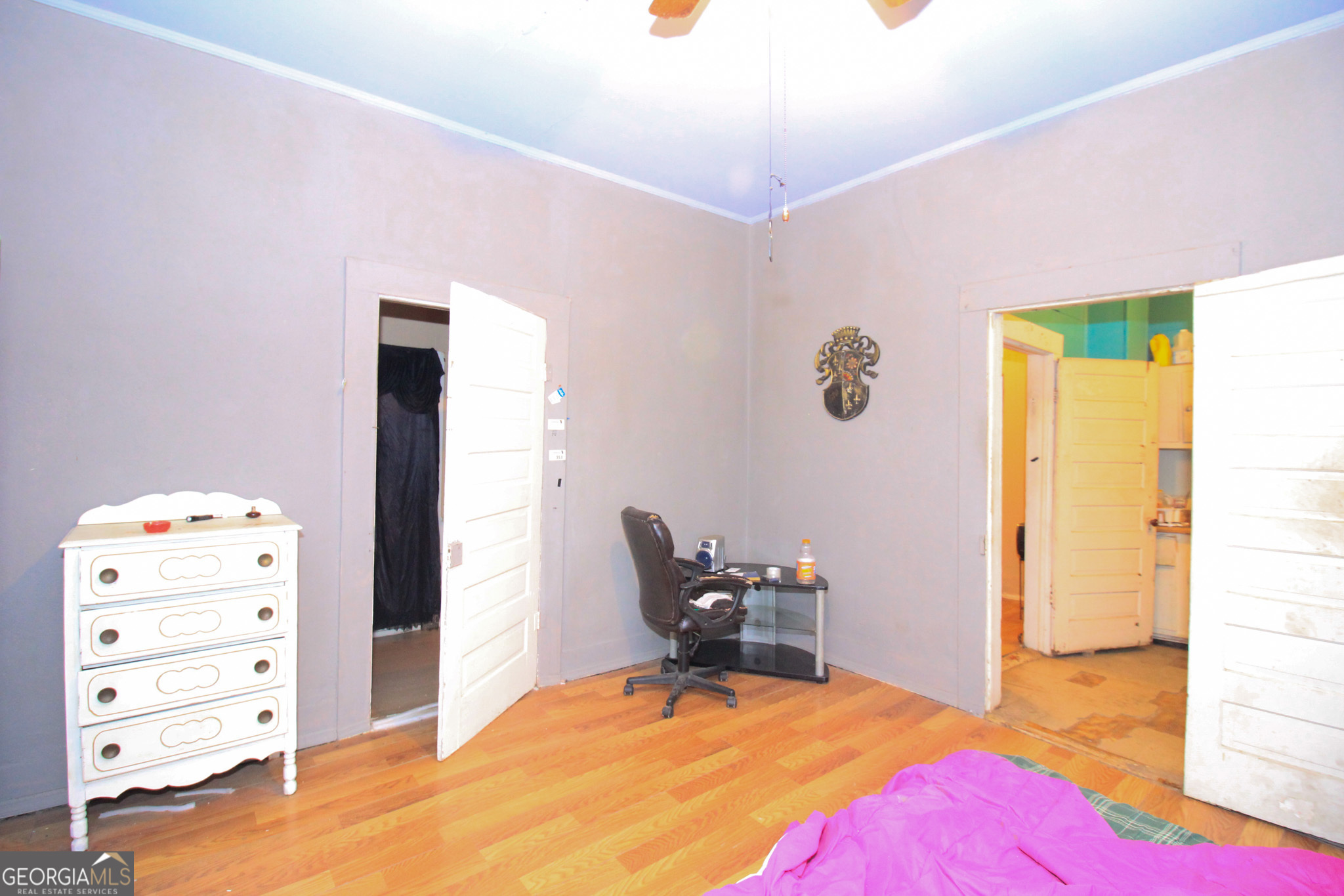 349 Madison Street Macon, GA 31201 - Photo 10 of 11 a bedroom with a bed and furniture