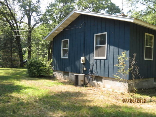 5982 Fowler Road Twin Lake, MI 49457 - Photo 5 of 24 side
