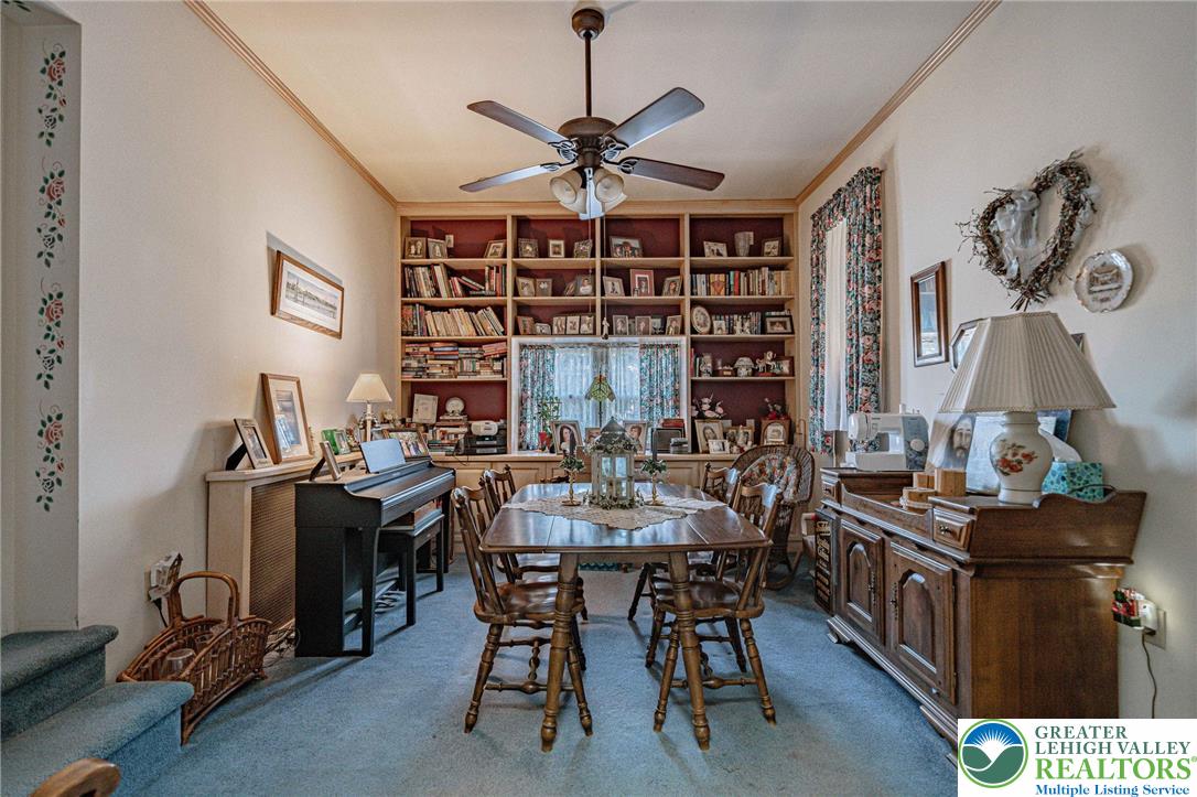 4250 Main Street Whitehall, PA 18052 - Photo 11 of 32 a view of a dining room with furniture and chandelier