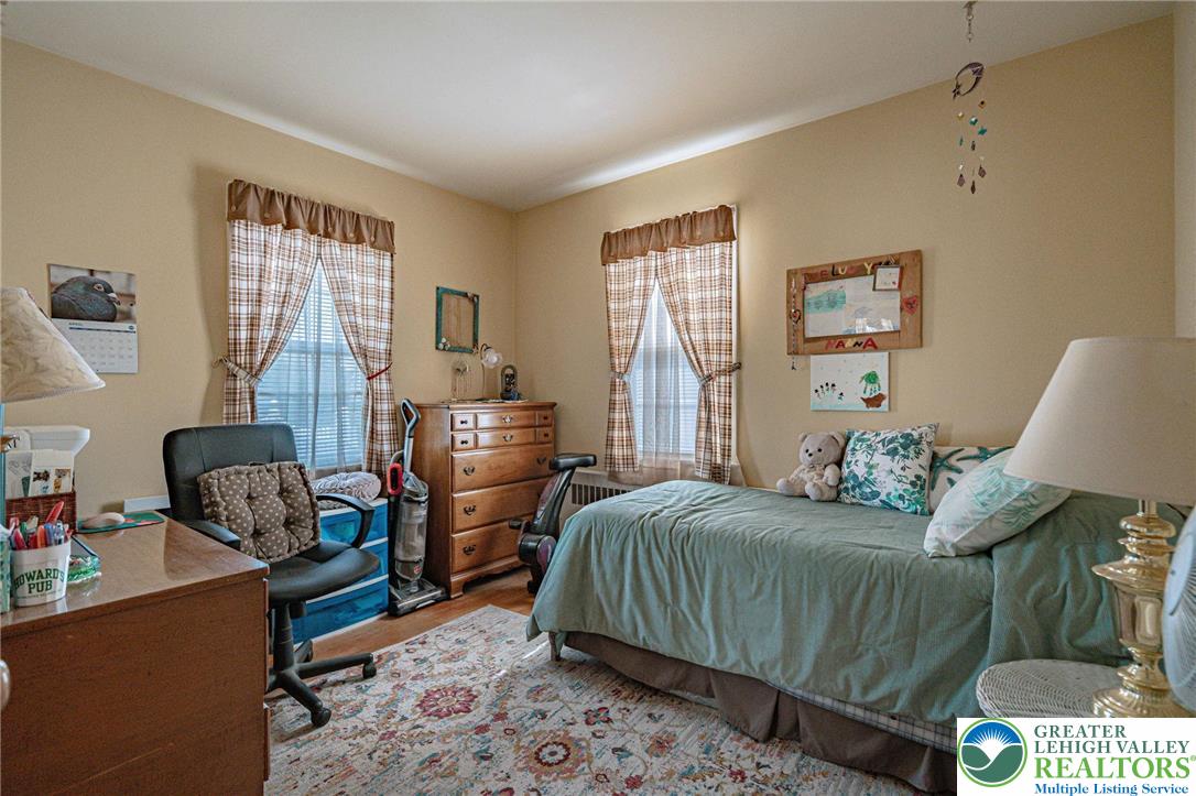 4250 Main Street Whitehall, PA 18052 - Photo 15 of 32 a bedroom with a bed and a window
