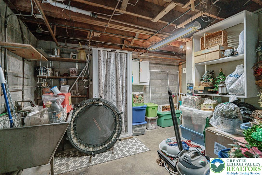 4250 Main Street Whitehall, PA 18052 - Photo 25 of 32 a room with furniture and a chandelier