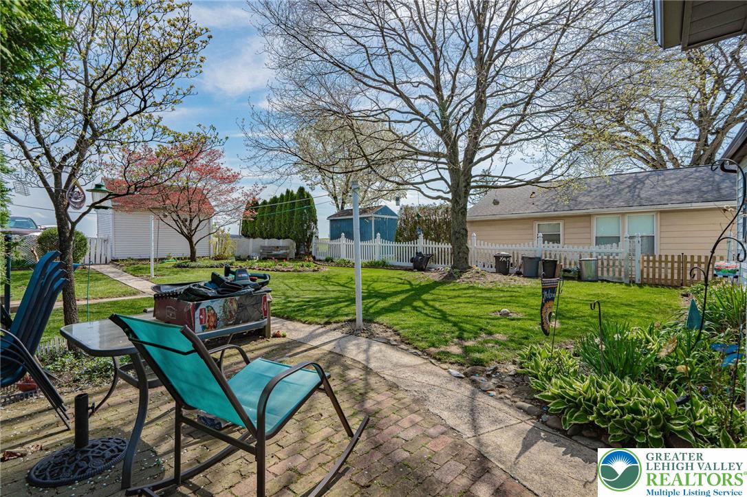 4250 Main Street Whitehall, PA 18052 - Photo 27 of 32 a view of a backyard with sitting area
