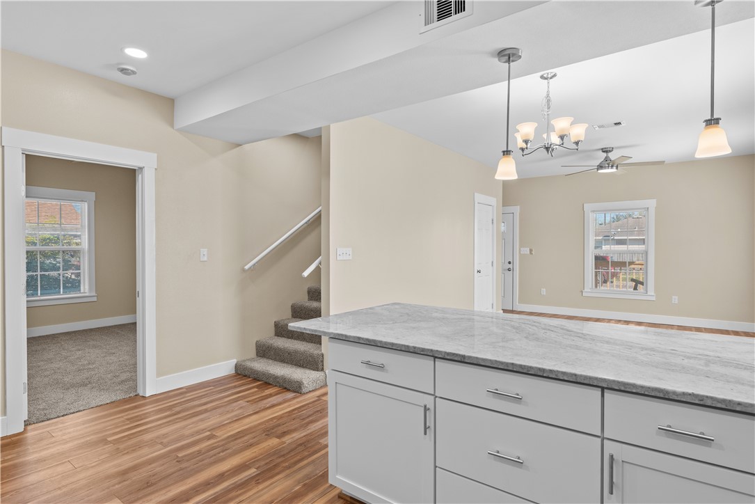 1017 12th Street Corpus Christi, TX 78404 - Photo 21 of 31 a view of a kitchen cabinets and wooden floor