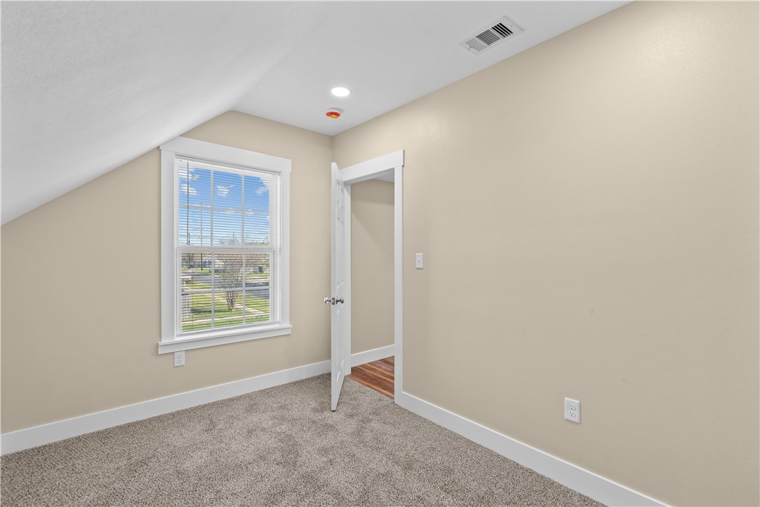 1017 12th Street Corpus Christi, TX 78404 - Photo 24 of 31 an empty room with windows and closet