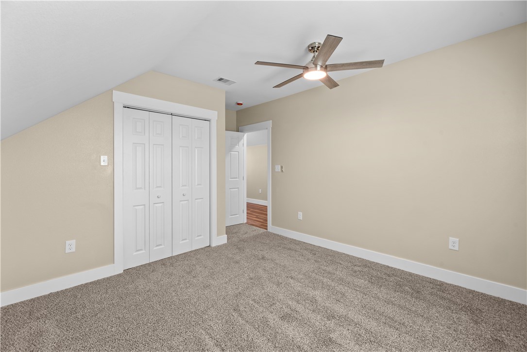 1017 12th Street Corpus Christi, TX 78404 - Photo 28 of 31 an empty room with closet and ceiling fan