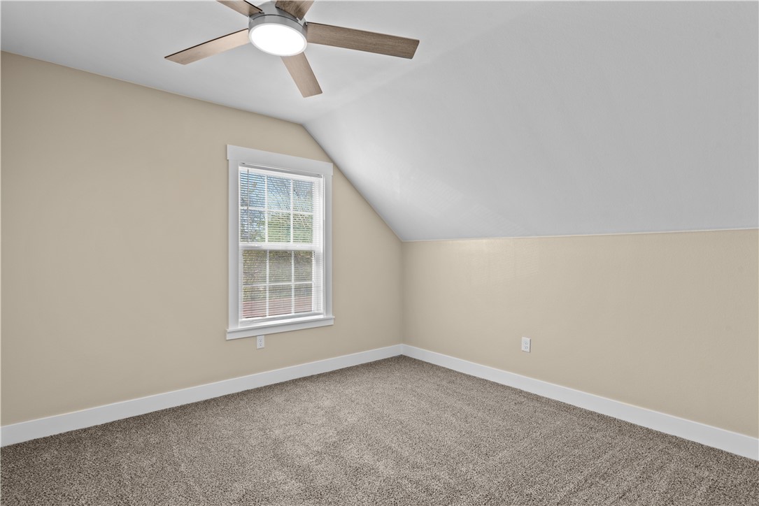 1017 12th Street Corpus Christi, TX 78404 - Photo 29 of 31 an empty room with a window and a fan