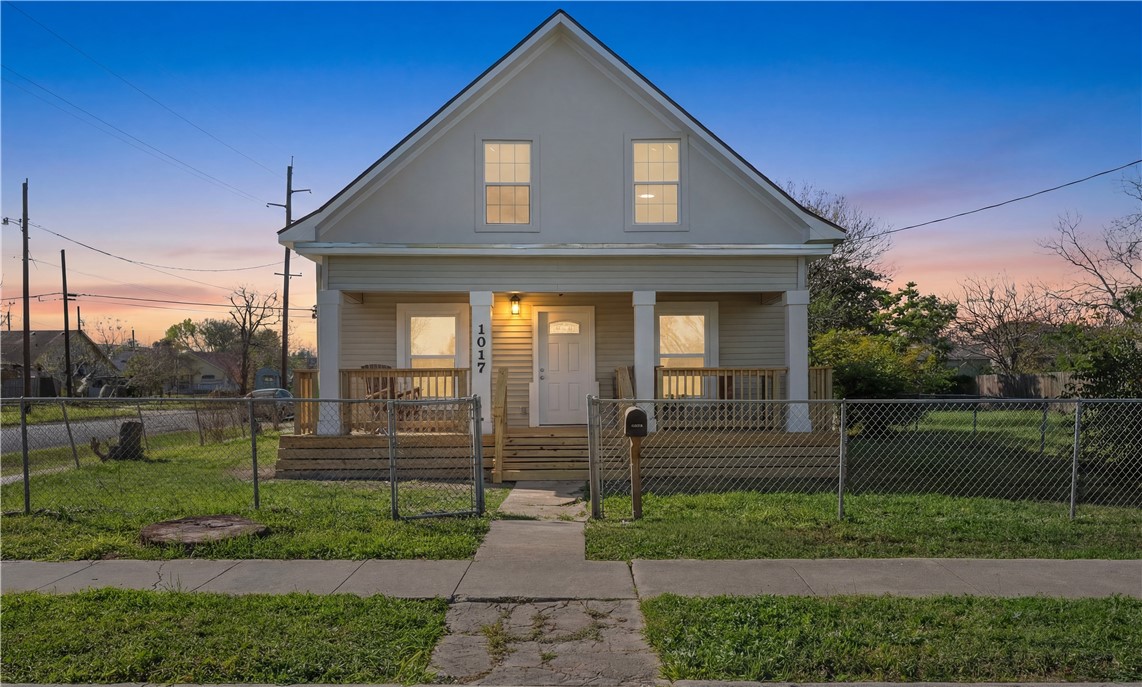 1017 12th Street Corpus Christi, TX 78404 - Photo 31 of 31 a front view of a house with a yard