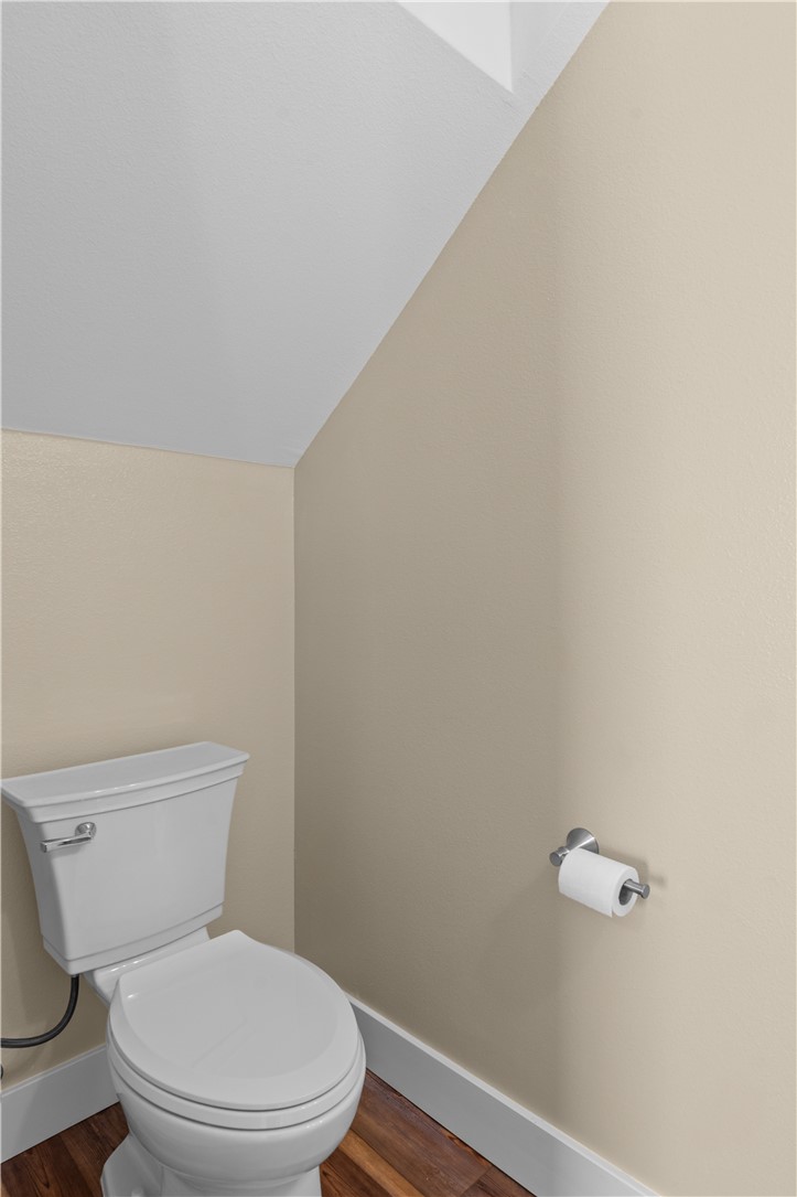 1017 12th Street Corpus Christi, TX 78404 - Photo 8 of 31 a white toilet sitting next to a shower