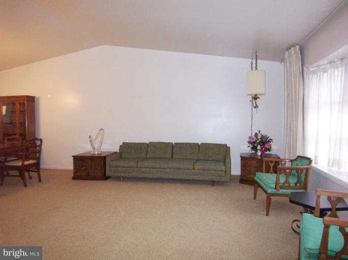 3712 Pinelea Road Windsor Mill, MD 21244 - Photo 1 of 18 Living Room w/ cathedral ceiling