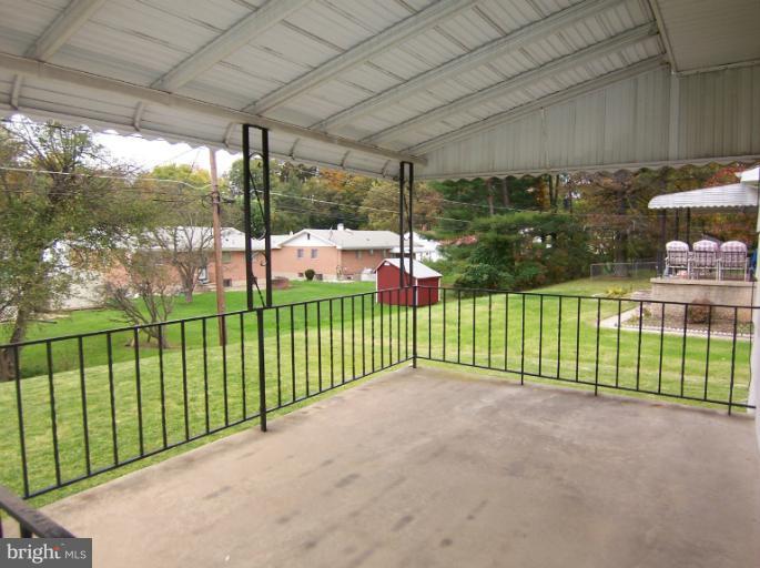 3712 Pinelea Road Windsor Mill, MD 21244 - Photo 4 of 18 Large covered rear porch
