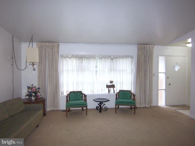 3712 Pinelea Road Windsor Mill, MD 21244 - Photo 10 of 18 Living Room w hardwood under carpet