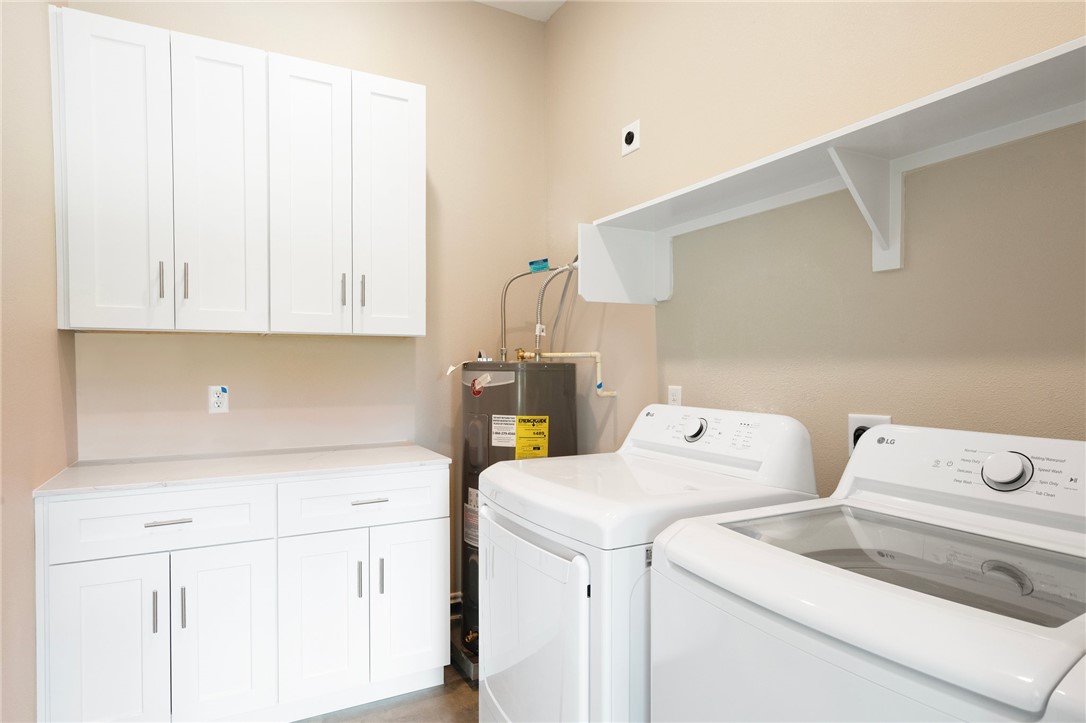 3213 Link Street, Unit 112 Bryan, TX 77801 - Photo 18 of 25 a utility room with dryer and washer