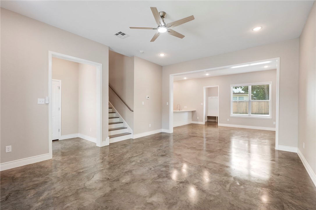 3213 Link Street, Unit 112 Bryan, TX 77801 - Photo 3 of 25 an empty room with windows and entryway
