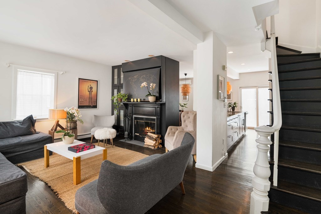 28 White Place Brookline, MA 02445 - Photo 1 of 18 a living room with furniture and a wooden floor