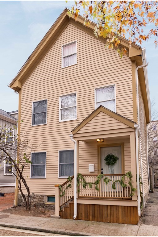 28 White Place Brookline, MA 02445 - Photo 18 of 18 a view of outdoor space yard and front view of a house