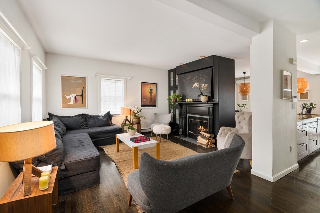 28 White Place Brookline, MA 02445 - Photo 2 of 18 a living room with furniture and wooden floor