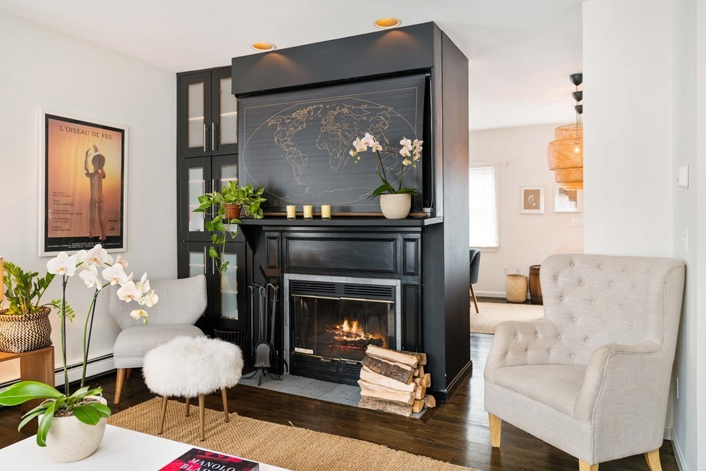 28 White Place Brookline, MA 02445 - Photo 3 of 18 a living room with furniture and a fireplace
