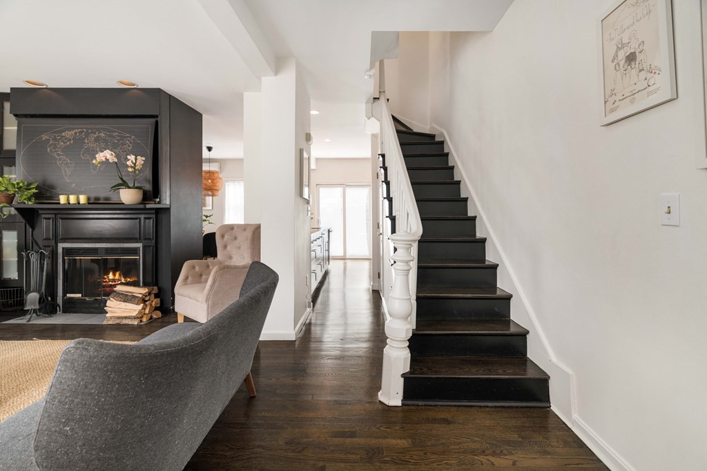 28 White Place Brookline, MA 02445 - Photo 9 of 18 a living room with furniture and a fireplace