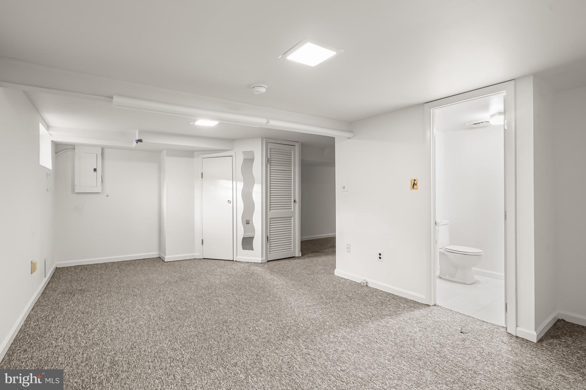 1807 37th Street Northwest Washington, DC 20007 - Photo 18 of 26 Lower-level rec room