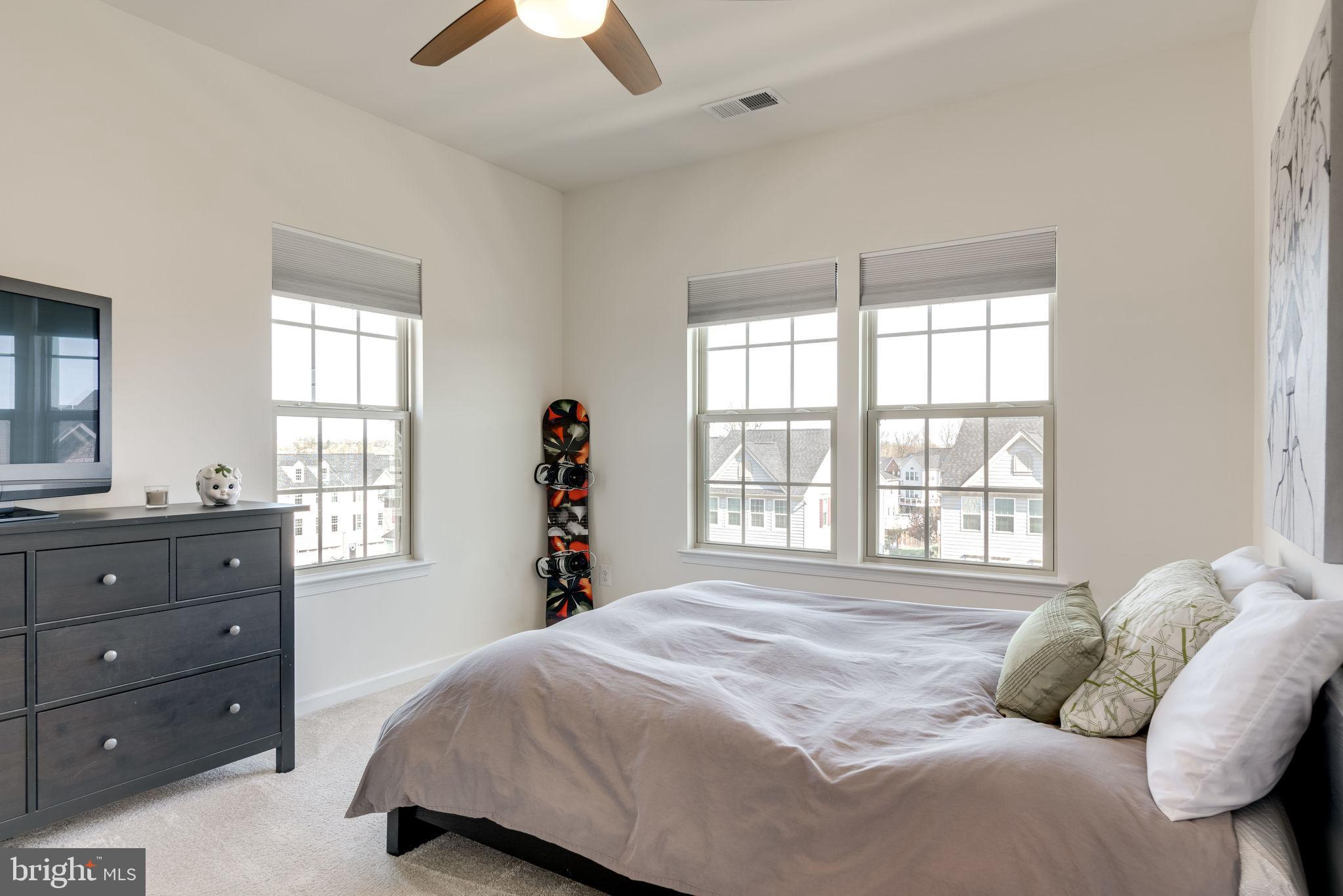 13617 Rockingham Lane Gainesville, VA 20155 - Photo 38 of 57 Spacious secondary bedroom 2, a corner of light