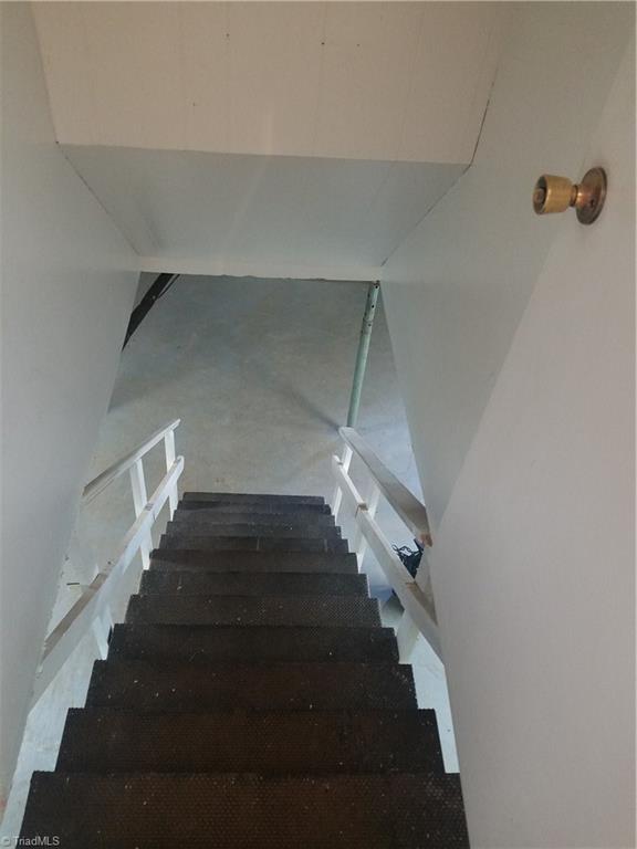 3240 Sourwood Ridge Road Lenoir, NC 28645 - Photo 21 of 25 Steps to Full Basement with garage door