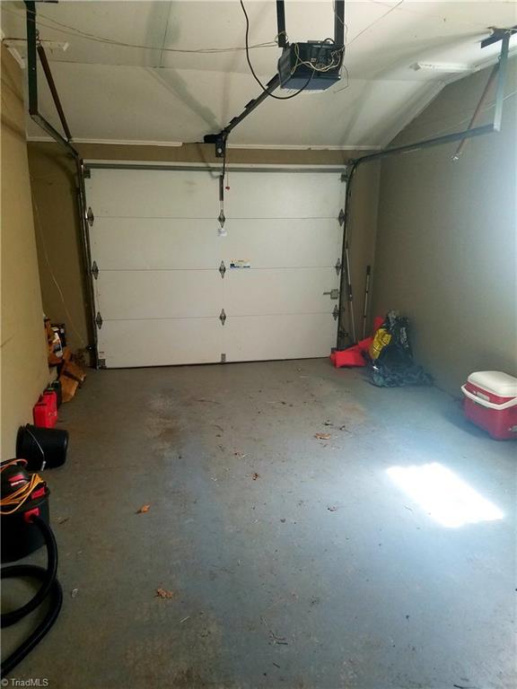 3240 Sourwood Ridge Road Lenoir, NC 28645 - Photo 25 of 25 Single garage upstairs with entry door to kitchen. Perfect for carrying in groceries.