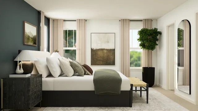 a bedroom with furniture and a window