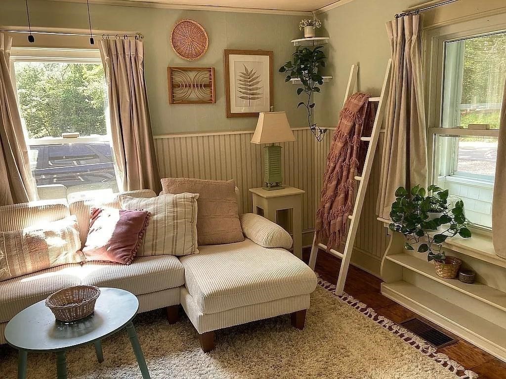 270 Wendell Depot Road Wendell, MA 01379 - Photo 14 of 42 a living room with furniture and a floor to ceiling window
