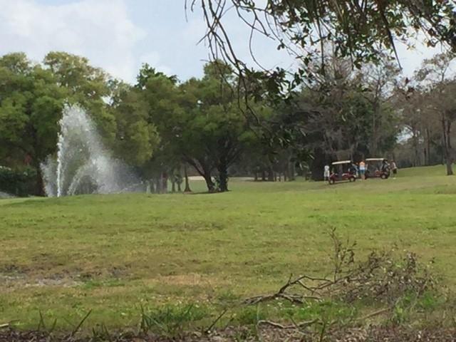 4216 Inverrary Boulevard, Unit 92A Lauderhill, FL 33319 - Photo 11 of 11 a view of outdoor space with deck and yard