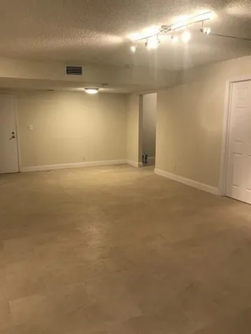 an empty room with an empty space