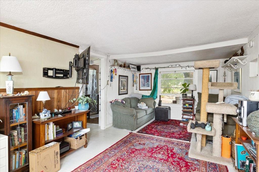 334 Date Avenue Carlsbad, CA 92008 - Photo 26 of 26 a living room with furniture and a window