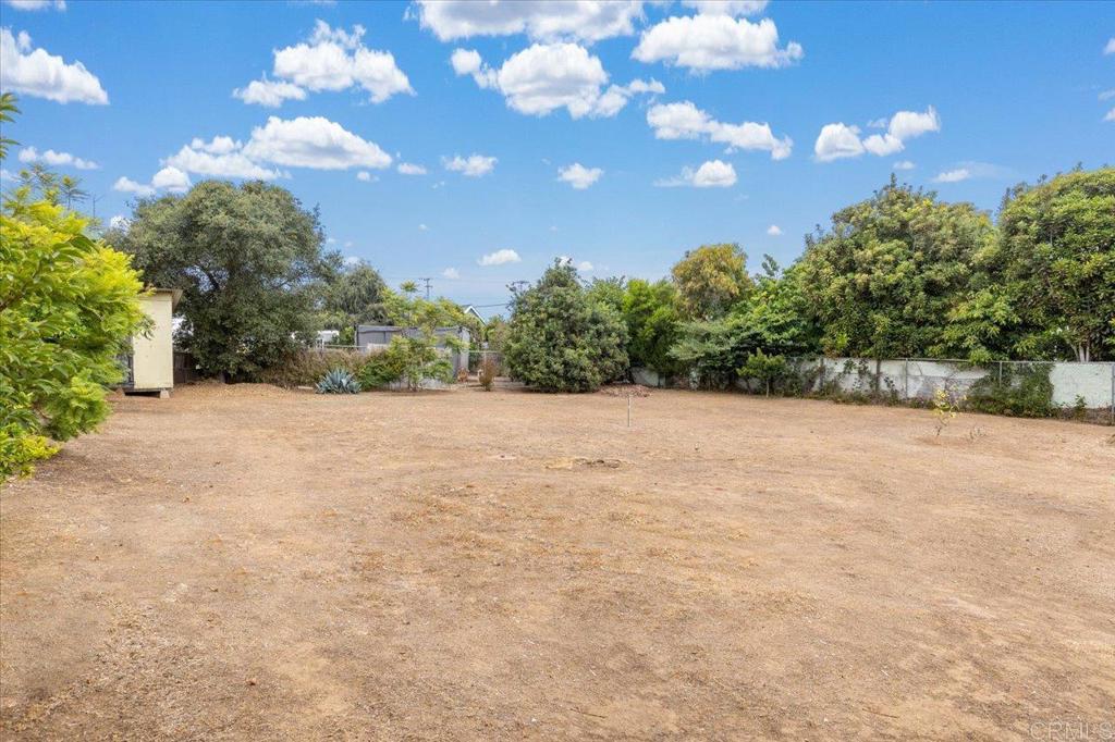 334 Date Avenue Carlsbad, CA 92008 - Photo 5 of 26 a view of yard with tree in back